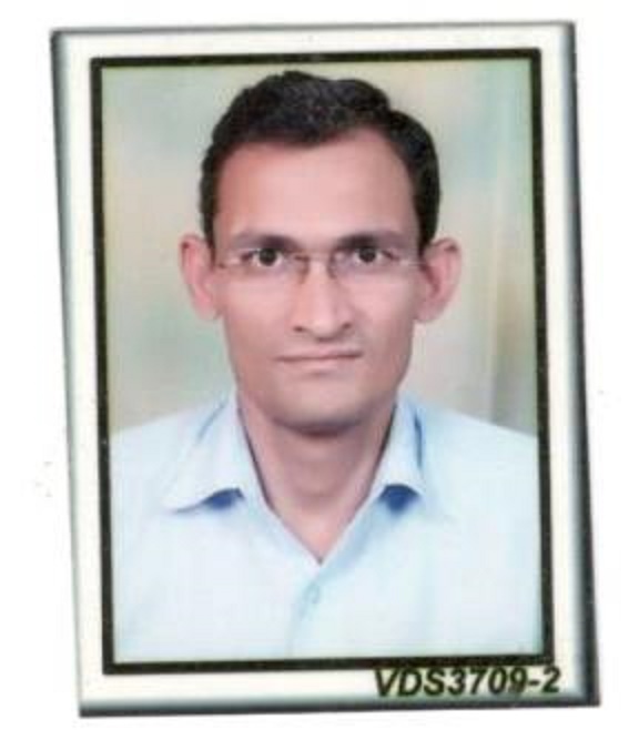 Dr. Navin Dixit
